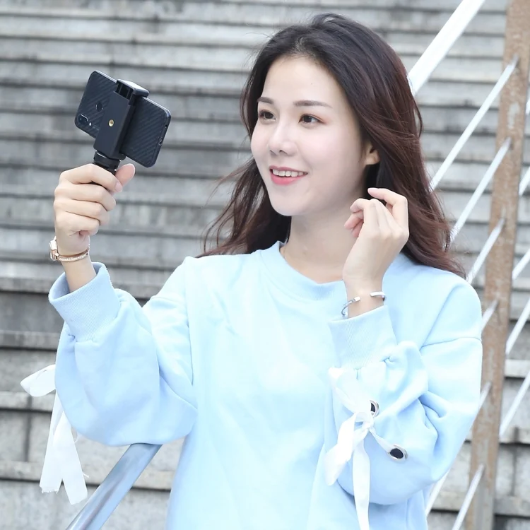 PU373_7.webp PULUZ Mini Plastic Tripod + Universal Phone Clamp Bracket, For iPhone, Galaxy, Huawei, Xiaomi, Sony, HTC, Google and other Smartphones - Image 8