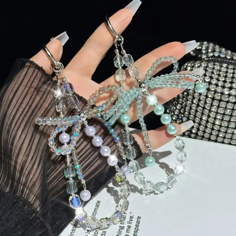 SYA0028136_B2.webp Diamond Crystal Bow Crystal Pearl Phone Chain - Image 3