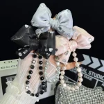 Sparkling Diamond Large Bow Pearl Phone Chain - Image 2