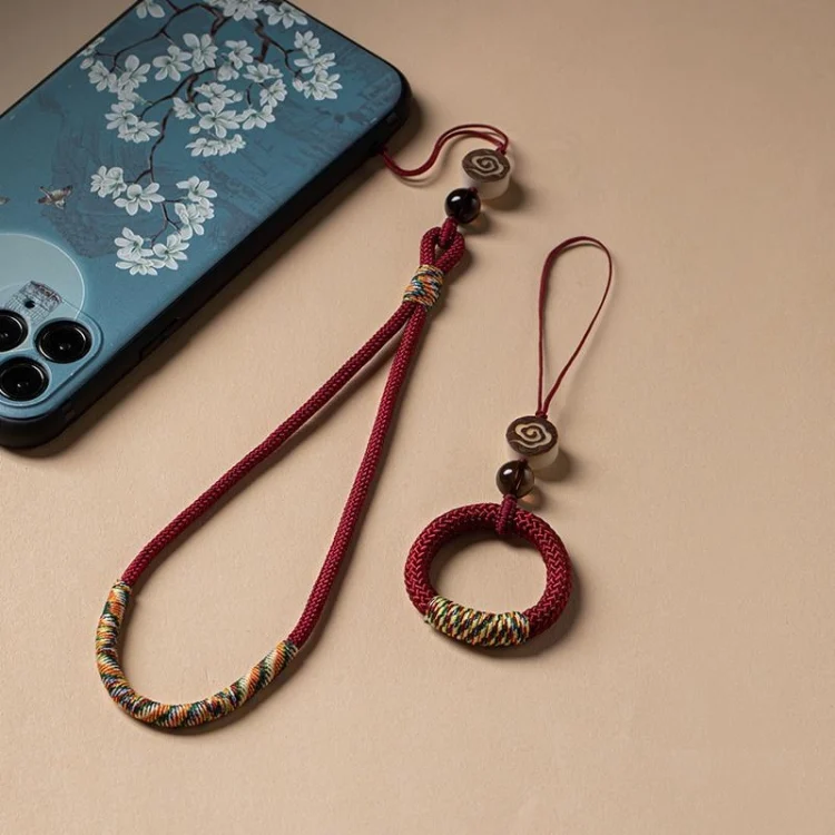 TBD06056067_B5.webp Carved Auspicious Cloud Hand-Woven Mobile Phone Anti-Lost Wrist Lanyard Key Pendant - Image 6