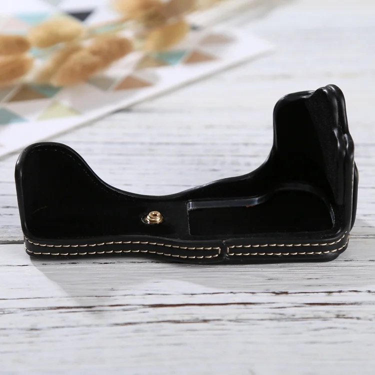 DCA6164B_1.webp 1/4 inch Thread PU Leather Camera Half Case Base for Canon EOS M3 - Image 2