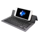 F18 Ultra-slim Rechargeable Foldable 58 Keys Bluetooth Wireless Keyboard with Holder - Image 4