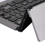 F18 Ultra-slim Rechargeable Foldable 58 Keys Bluetooth Wireless Keyboard with Holder - Image 8