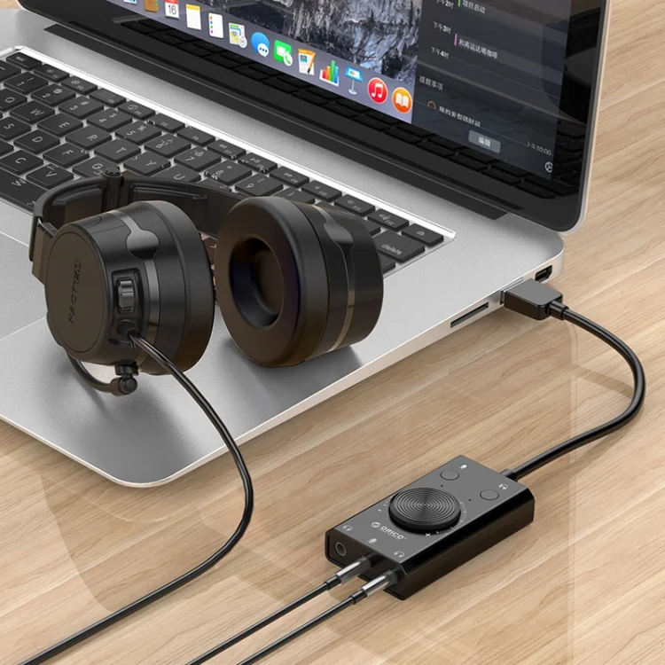 PC9528B_6.webp ORICO SC2 Multi-function USB External Driver-free Sound Card with 2 x Headset Ports & 1 x Microphone Port & Volume Adjustment - Image 7