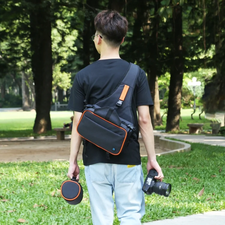 PU5014B_6.webp PULUZ Triangle Style SLR Camera Bag Sling Waterproof Backpack Shoulder Messenger Bags with Removable Lens Bag - Image 7