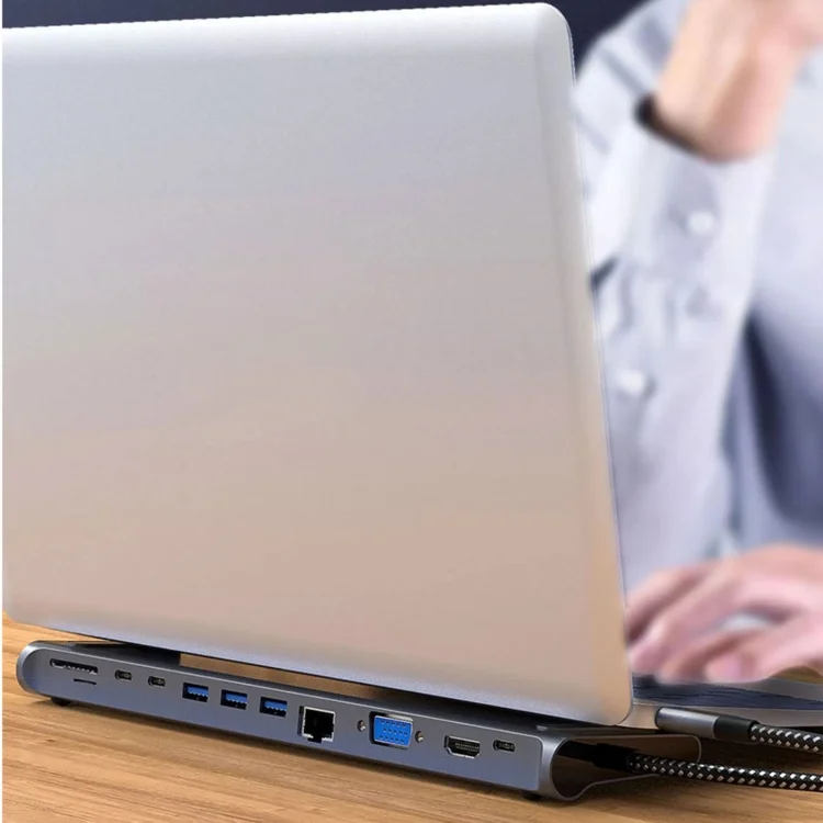 TBD0602083801A.webp 12 In 1 Multifunctional TYPE-C Extension HUB Adapter With Stand Function - Image 1