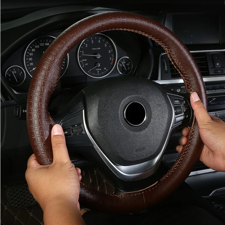 TBD06051756_B7.webp Four-season Embossed Cowhide Hand-sewn Steering Wheel Cover - Image 8
