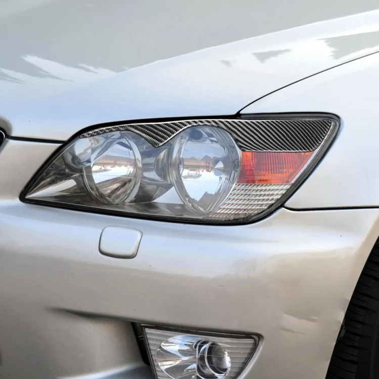 CRP6985_4.webp 2 PCS / Set Carbon Fiber Car Lamp Eyebrow Decorative Sticker for Lexus IS300/IS200/RS200/ALTezza 1998-2005, Drop Glue Version - Image 5