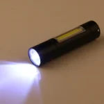 A1 USB Charging Waterproof Fixed Focus XPE + COB Flashlight with 3-Modes & Storage Box - Image 5