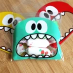 100 PCS Cute Big Teech Mouth Monster Plastic Bag Wedding Birthday Cookie Candy Gift OPP Packaging Bags - Image 4