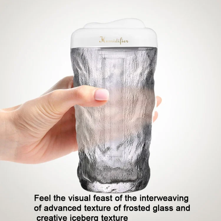 TBD06039703_B2.webp Iceberg Small Car Humidifier Atomization Mute Colorful Aromatherapy Machine - Image 3