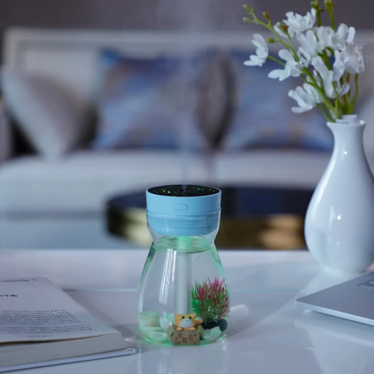TBD0604522201A.webp FH-068 Mini USB Car Home Colorful Light Bottle Micro Landscape Humidifier - Image 1
